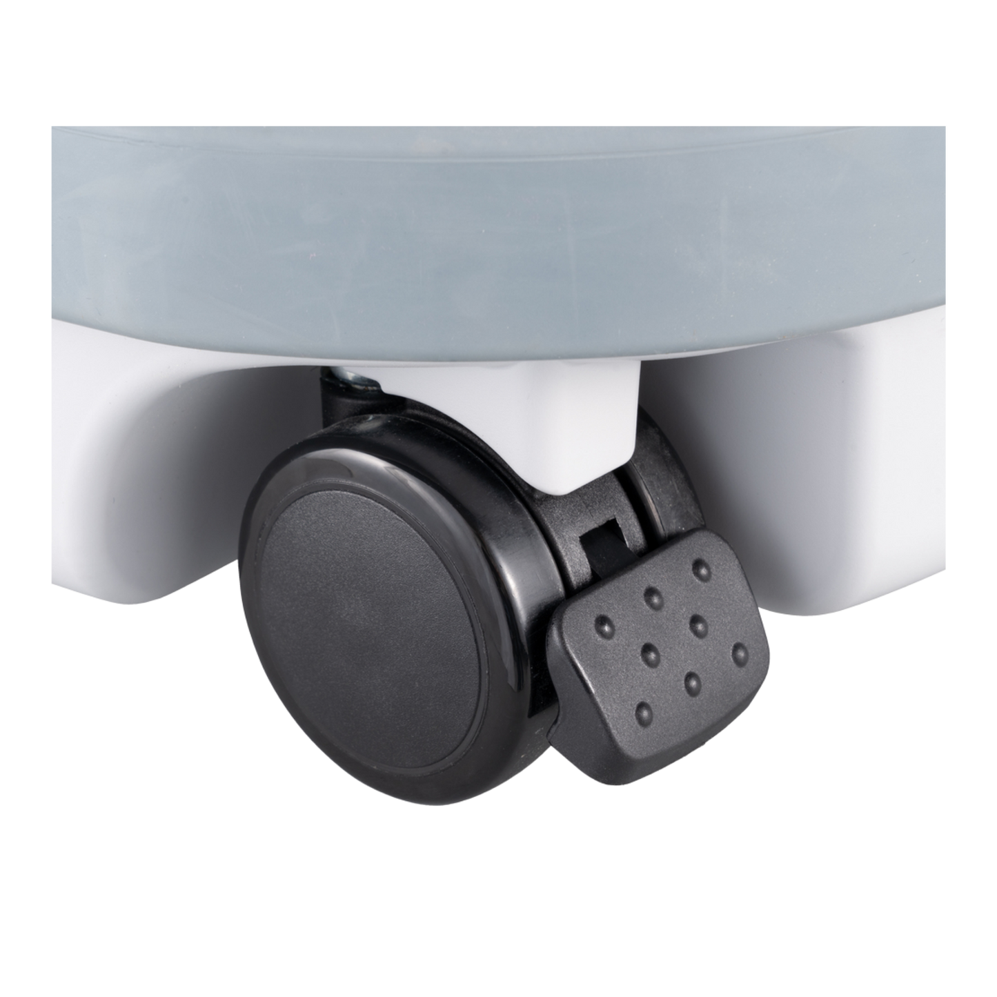 Close-up of a black wheel on a white background