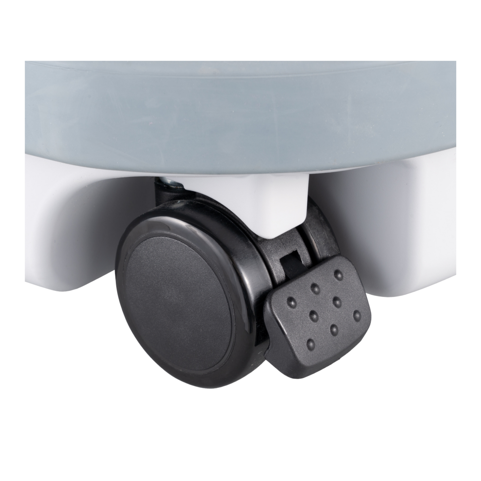 Close-up of a black wheel on a white background