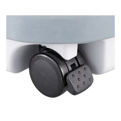 Close-up of a black wheel on a white background
