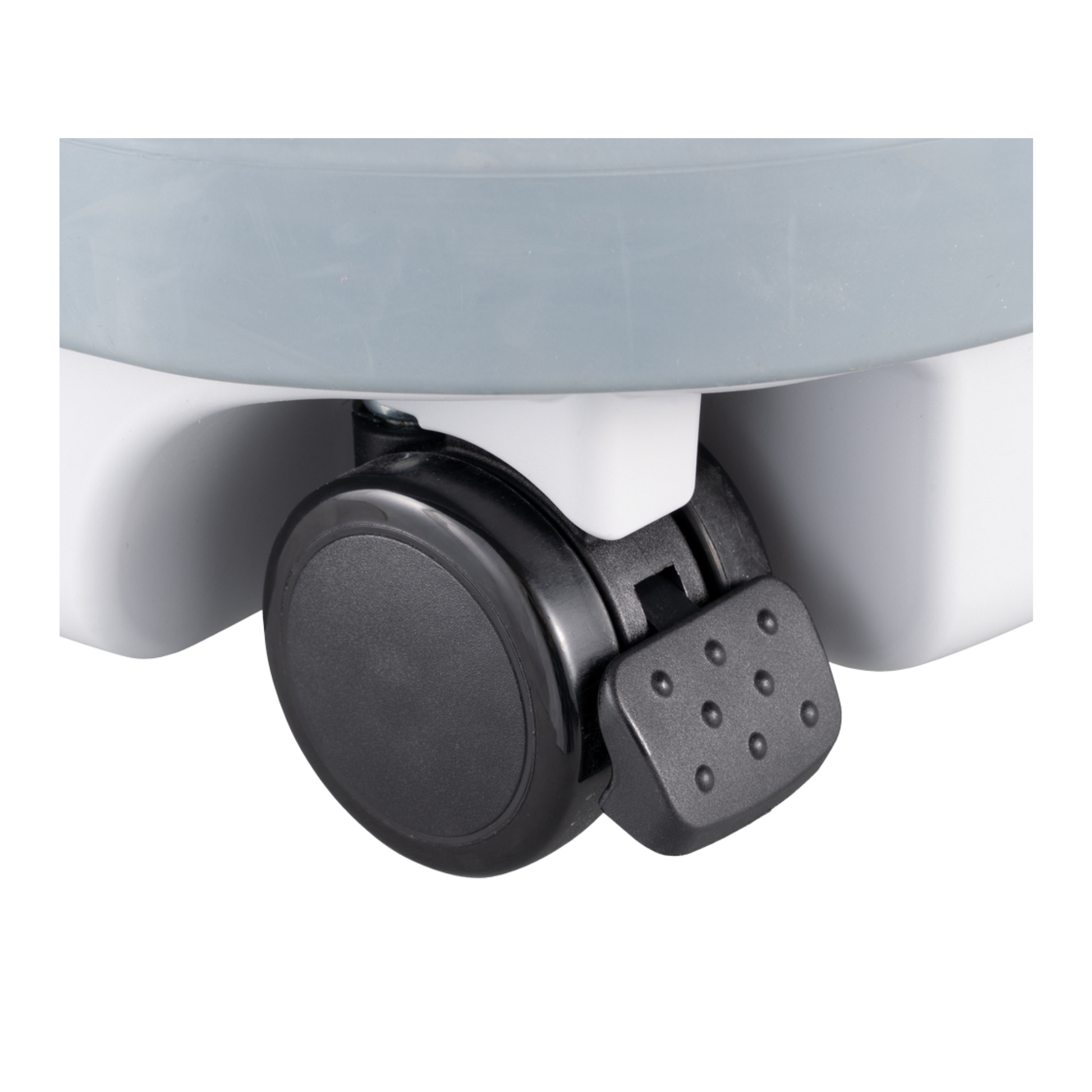 Close-up of a black wheel on a white background