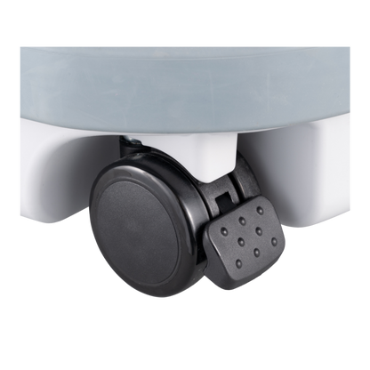 Close-up of a black wheel on a white background