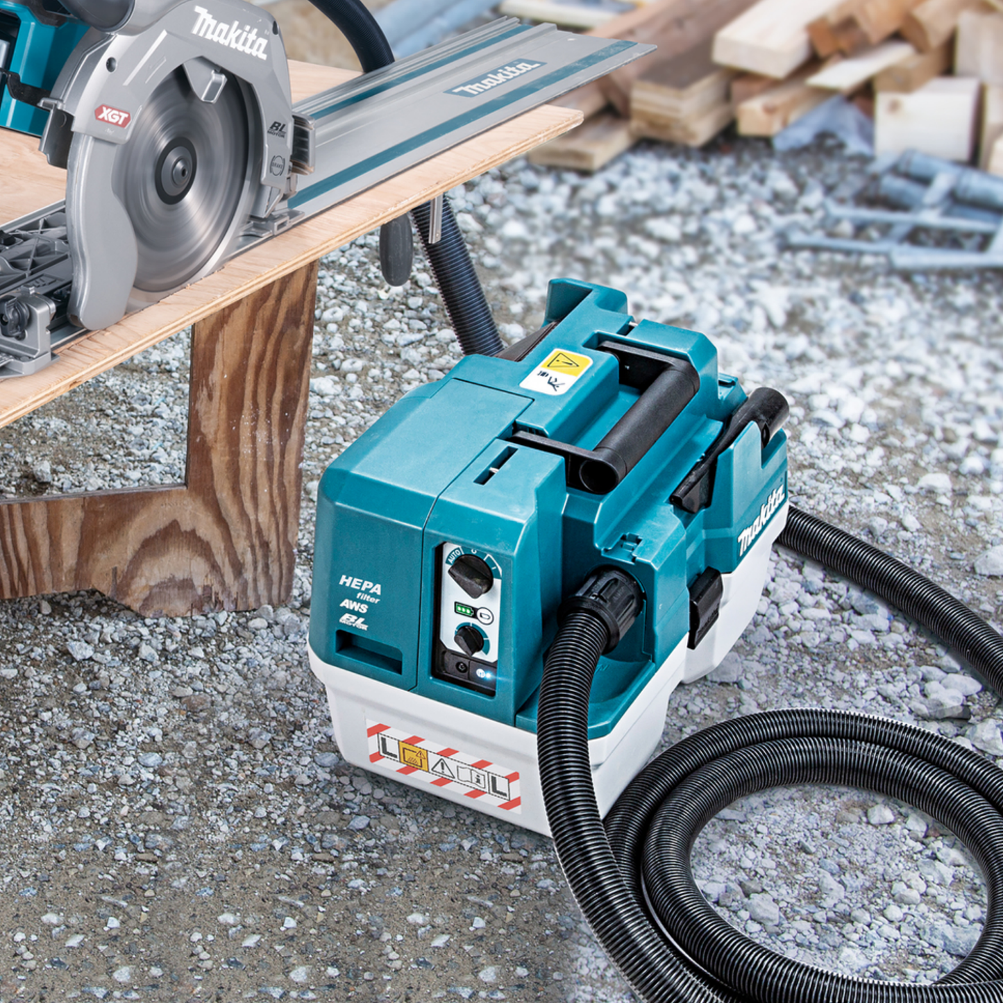 Makita power tool with hose on a construction site