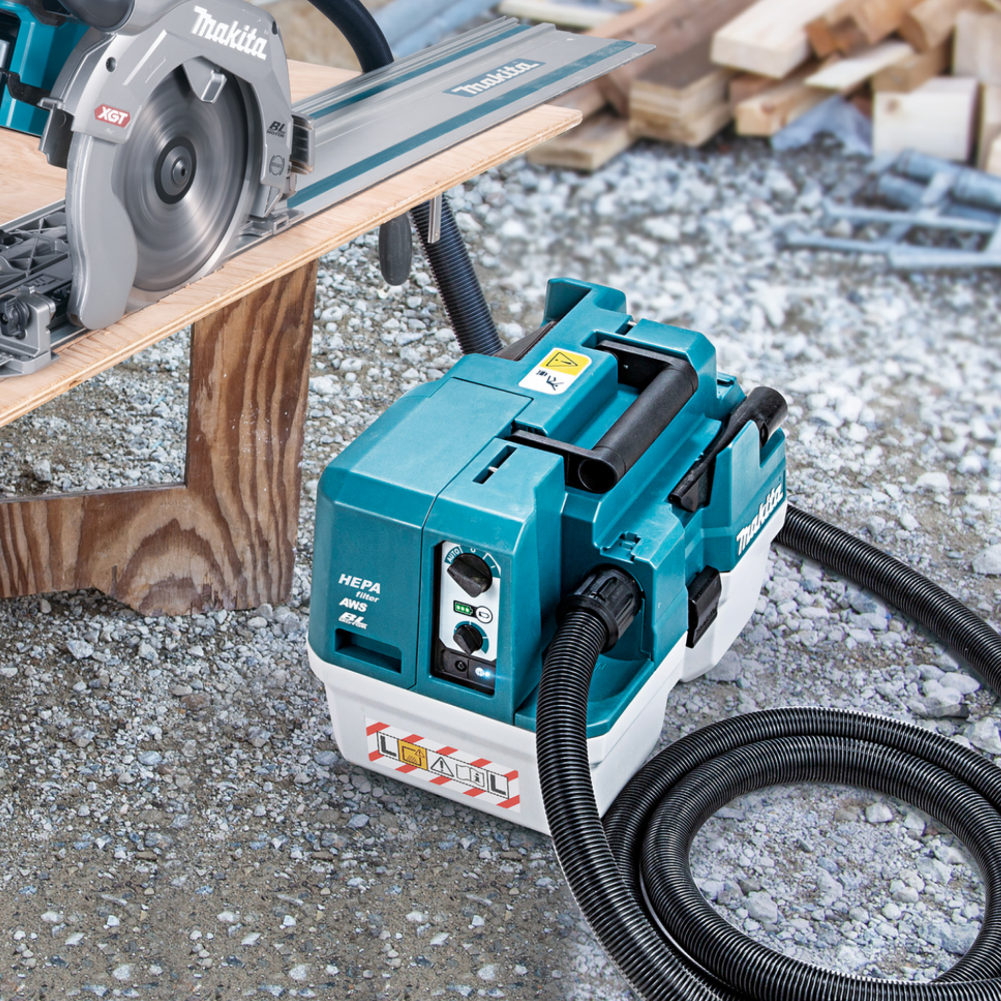 Makita power tool with hose on a construction site
